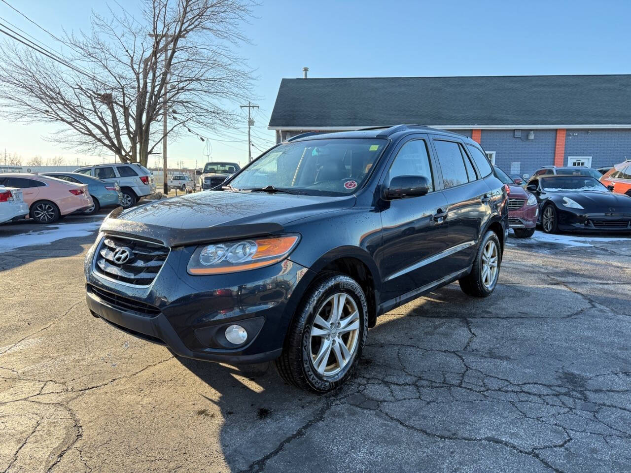 2010 Hyundai SANTA FE for sale at AVS AUTO GROUP LLC in CLEVELAND, OH