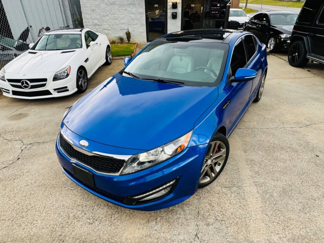 2013 Kia Optima for sale at AUTO LUX INC in Marietta, GA