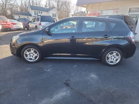 2009 Pontiac Vibe for sale at Maximum Auto Group II INC in Cortland OH