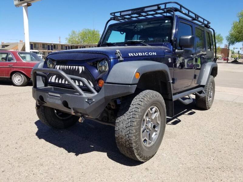 2013 Jeep Wrangler Unlimited for sale at Alpine Motors LLC in Laramie WY