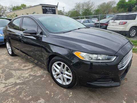 2015 Ford Fusion for sale at DAMM CARS in San Antonio TX