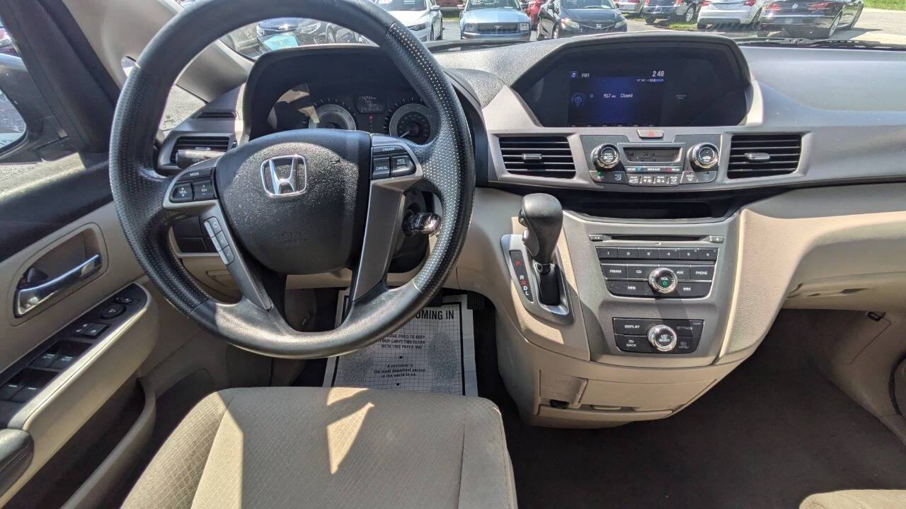 2014 Honda Odyssey for sale at Celebrity Auto Sales in Fort Pierce, FL