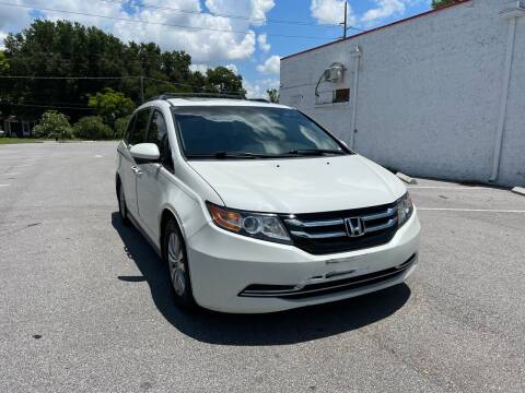2014 Honda Odyssey for sale at Consumer Auto Credit in Tampa FL