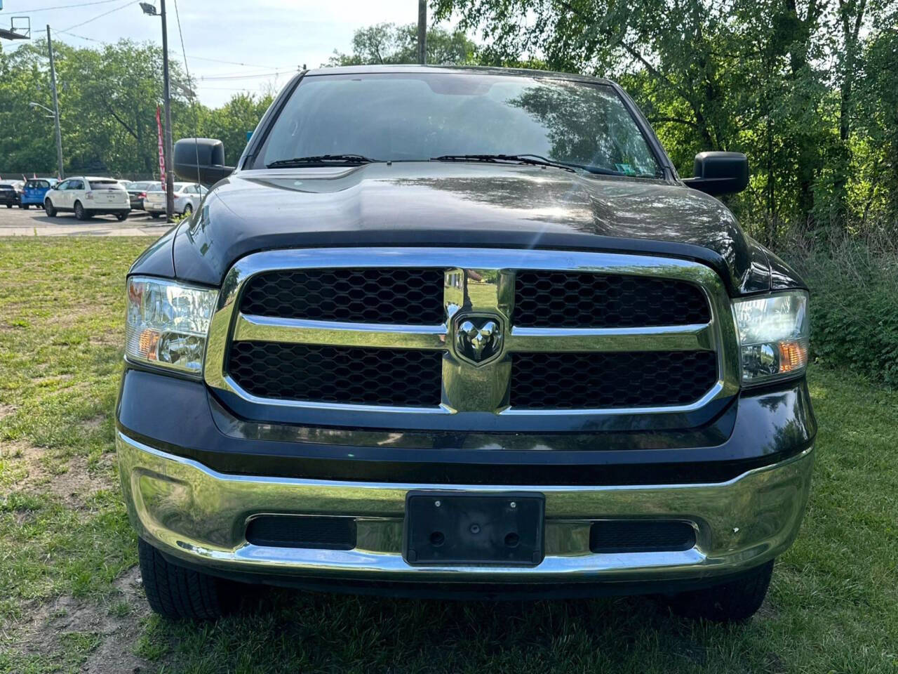 Black 2013 Ram 1500 SLT 4x4 SLT 4dr Quad Cab 6.3 ft. SB Pickup 2