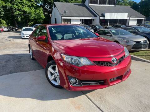 2014 Toyota Camry for sale at Alpha Car Land LLC in Snellville GA