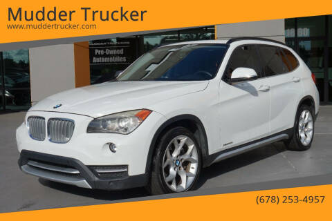 2013 BMW X1 for sale at Mudder Trucker in Conyers GA