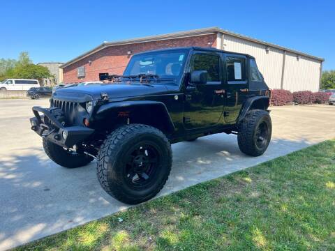 2011 Jeep Wrangler Unlimited for sale at A&M Enterprises in Concord NC
