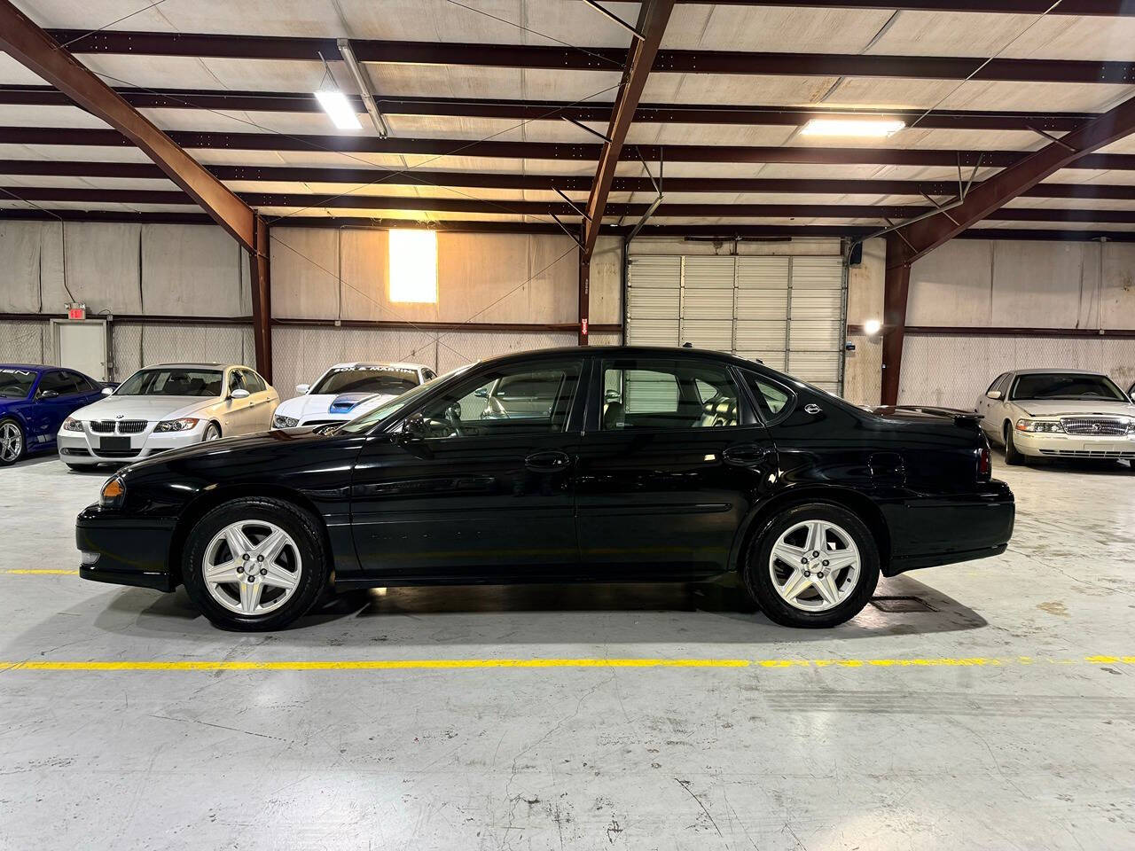 2004 Chevrolet Impala for sale at Carnival Car Company in Victoria, TX