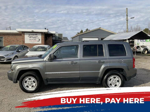 2014 Jeep Patriot for sale at Autocom, LLC in Clayton NC