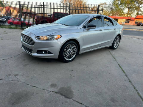 2014 Ford Fusion for sale at Preferable Auto LLC in Houston TX