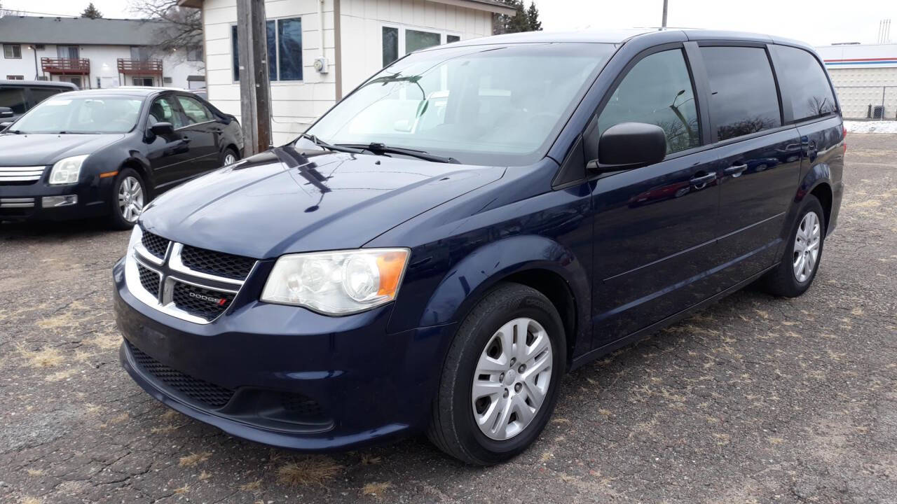 2014 Dodge Grand Caravan for sale at CHRISTIAN AUTO SALES in Anoka, MN