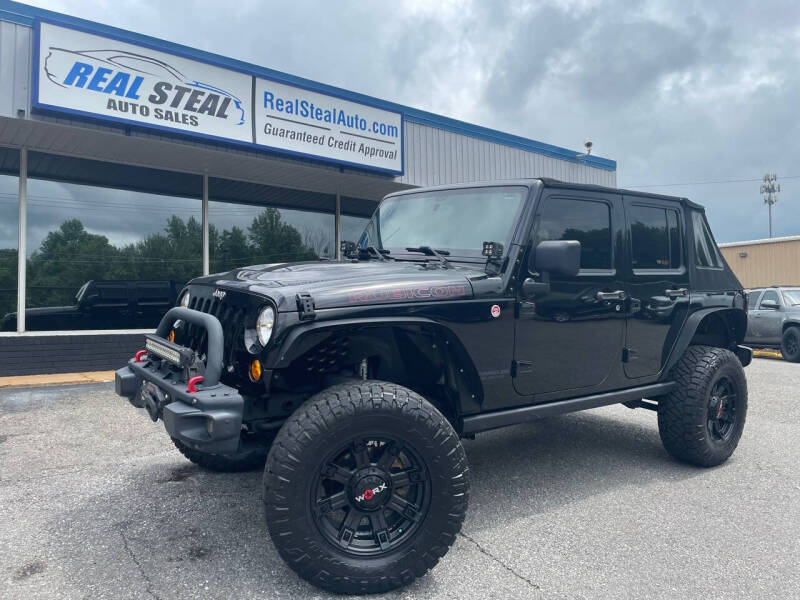 2014 Jeep Wrangler Unlimited for sale at Real Steal Auto Sales & Repair Inc in Gastonia NC