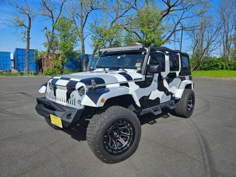 2017 Jeep Wrangler Unlimited for sale at Positive Auto Sales, LLC in Hasbrouck Heights NJ