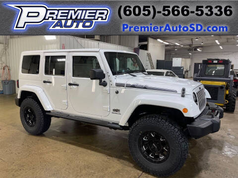 2014 Jeep Wrangler Unlimited for sale at Premier Auto in Sioux Falls SD