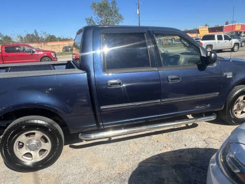 2003 Ford F-150 for sale at SCOTT HARRISON MOTOR CO in Houston TX