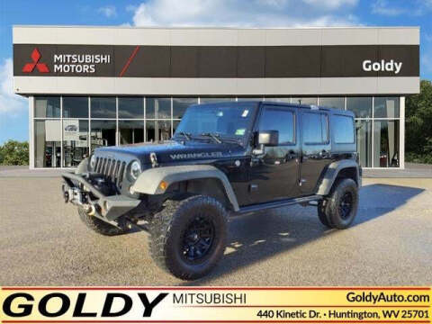 2016 Jeep Wrangler Unlimited for sale at Goldy Chrysler Dodge Jeep Ram Mitsubishi in Huntington WV