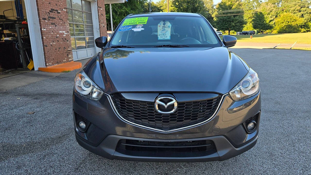 2015 Mazda CX-5 for sale at North Ridge Auto Center LLC in Madison, OH