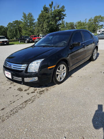 2009 Ford Fusion for sale at WESTSIDE GARAGE LLC in Keokuk IA