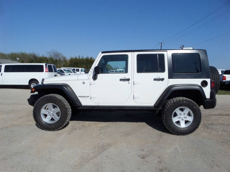 2010 Jeep Wrangler Unlimited for sale at AUTO FLEET REMARKETING, INC. in Van Alstyne TX