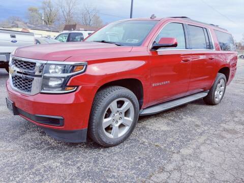 2015 Chevrolet Suburban for sale at The Car Cove, LLC in Muncie IN