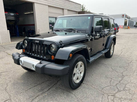 2012 Jeep Wrangler Unlimited for sale at Dean's Auto Sales in Flint MI