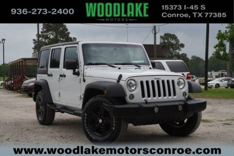 2016 Jeep Wrangler Unlimited for sale at WOODLAKE MOTORS in Conroe TX