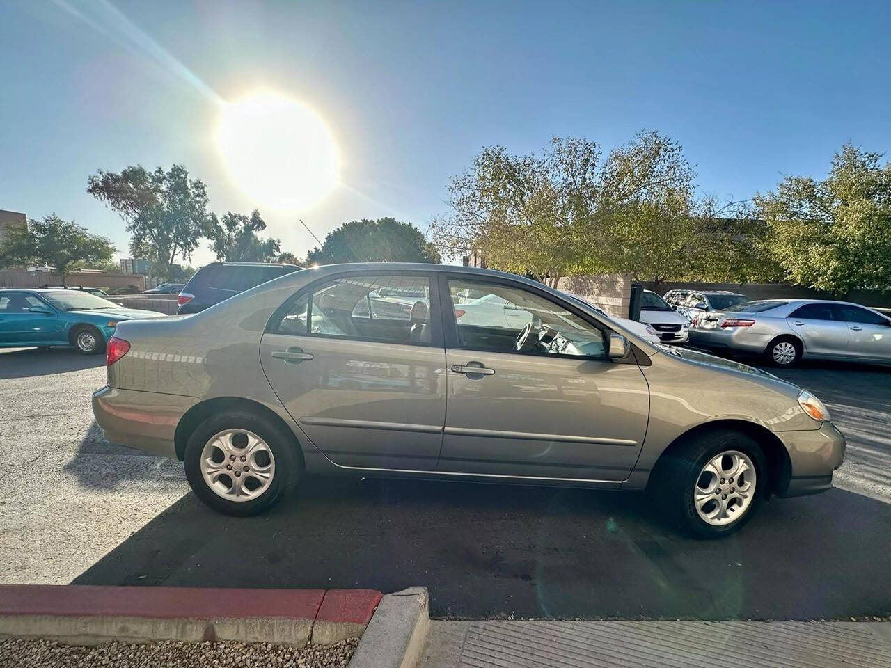 2003 Toyota Corolla for sale at HUDSONS AUTOS in Gilbert, AZ