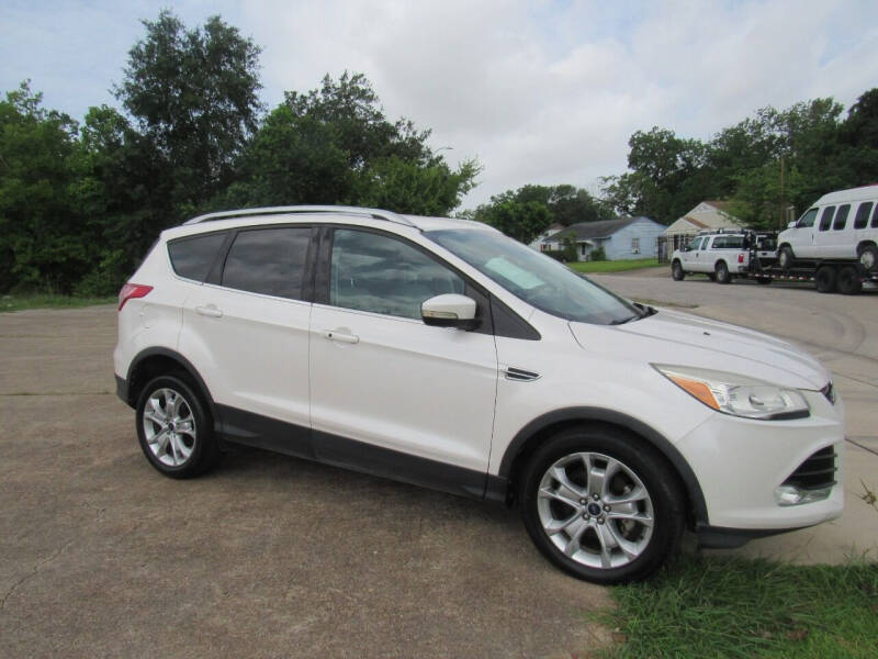 Used 2014 Ford Escape Titanium with VIN 1FMCU0JX4EUB44661 for sale in Houston, TX