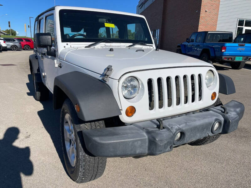 2012 Jeep Wrangler Unlimited for sale at Postal Pete in Galena IL