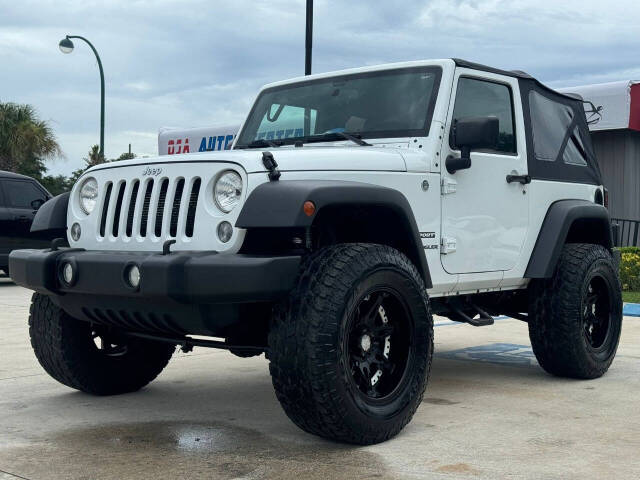 2014 Jeep Wrangler for sale at DJA Autos Center in Orlando, FL