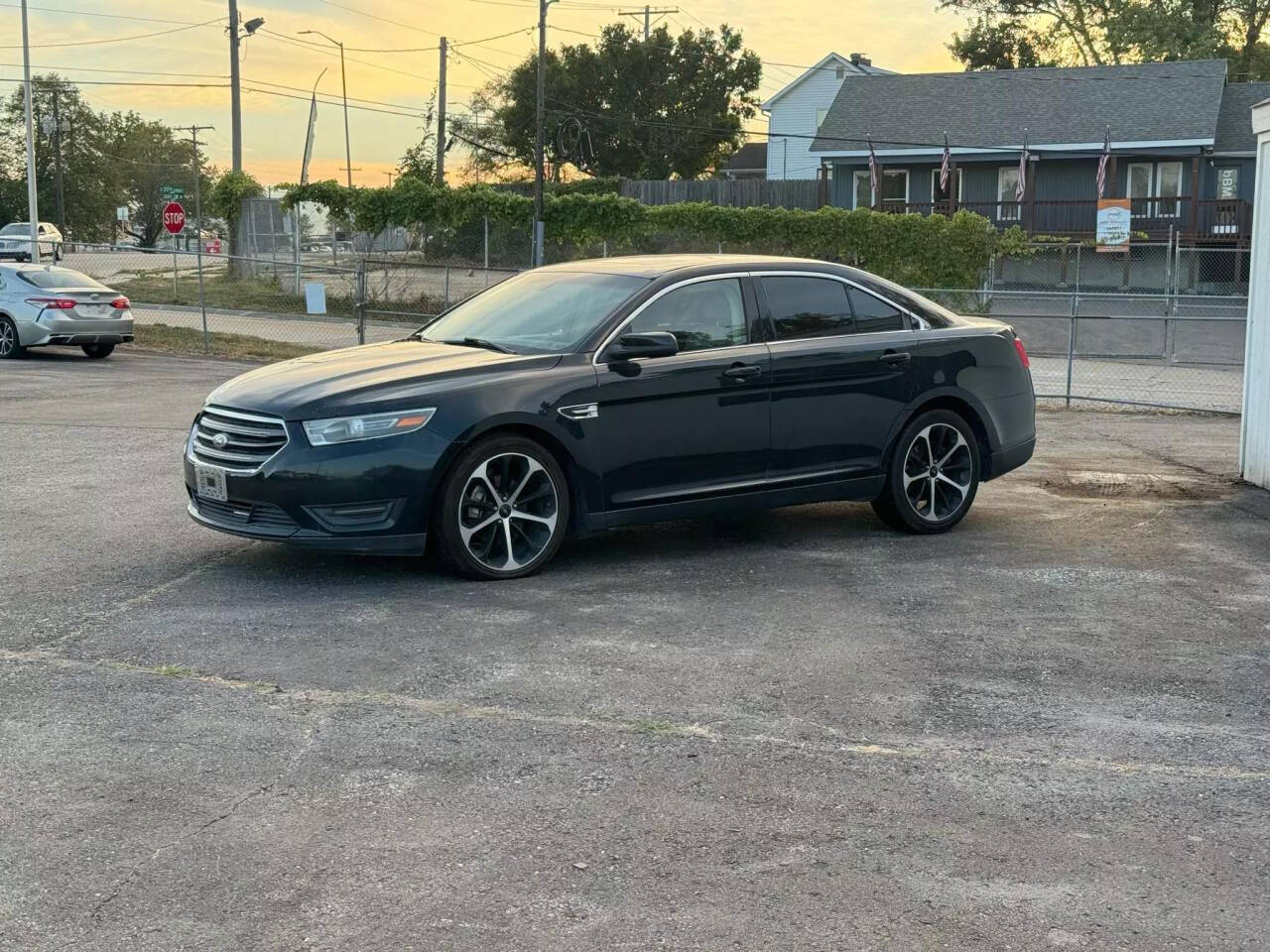 2014 Ford Taurus for sale at Autolink in Kansas City, KS