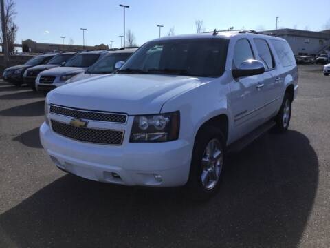 2012 Chevrolet Suburban for sale at Sparkle Auto Sales in Maplewood MN