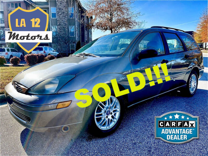2003 Ford Focus for sale at LA 12 Motors in Durham NC