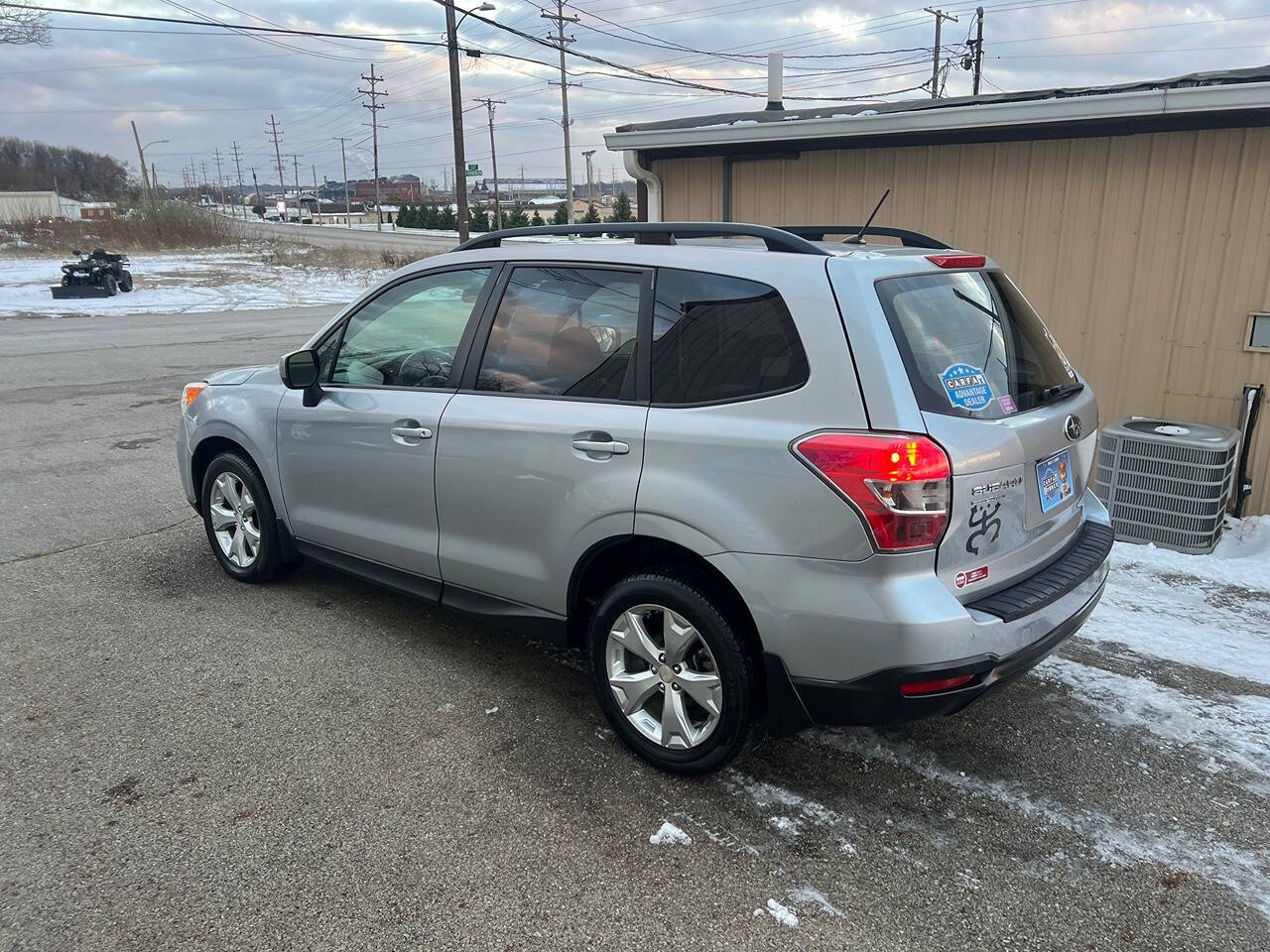 2014 Subaru Forester for sale at BNM AUTO GROUP in GIRARD, OH