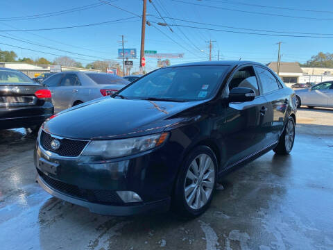 2010 Kia Forte for sale at SW AUTO LLC in Lafayette LA