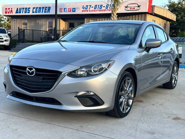 2015 Mazda Mazda3 for sale at DJA Autos Center in Orlando, FL