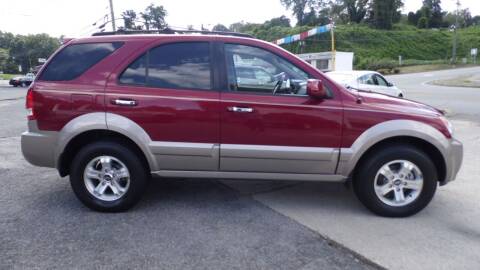 2004 Kia Sorento for sale at G AND J MOTORS in Elkin NC