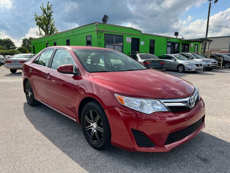 2012 Toyota Camry for sale at Marvin Motors in Kissimmee FL