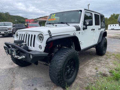 2015 Jeep Wrangler Unlimited for sale at PIONEER USED AUTOS & RV SALES in Lavalette WV