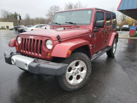 2013 Jeep Wrangler Unlimited for sale at Cruisin' Auto Sales in Madison IN