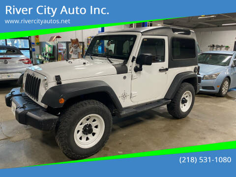 2013 Jeep Wrangler for sale at River City Auto Inc. in Fergus Falls MN