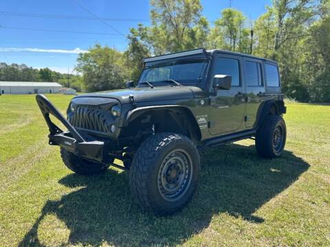 2015 Jeep Wrangler Unlimited for sale at SELECT AUTO SALES in Mobile AL