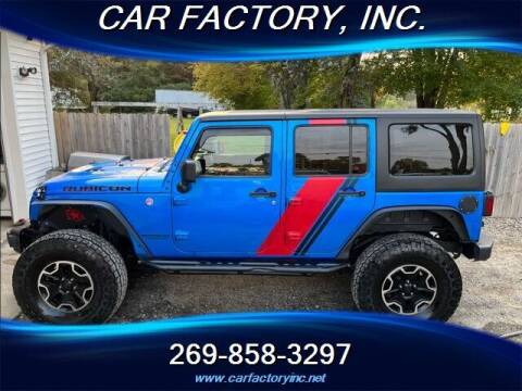 2016 Jeep Wrangler Unlimited for sale at Car Factory Inc. in Three Rivers MI