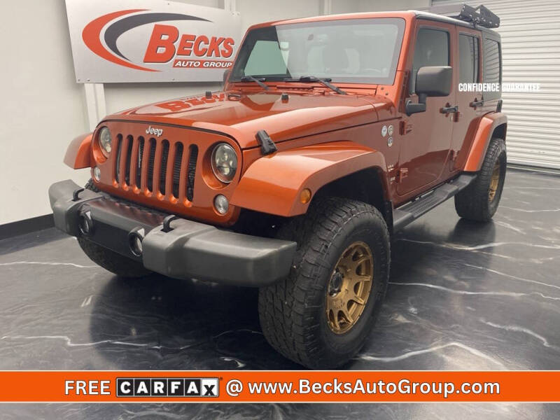 2014 Jeep Wrangler Unlimited for sale at Becks Auto Group in Mason OH