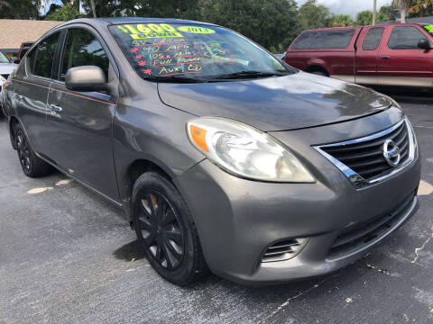 2013 Nissan Versa for sale at RIVERSIDE MOTORCARS INC - South Lot in New Smyrna Beach FL