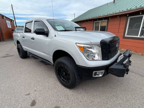 2017 Nissan Titan for sale at BERKENKOTTER MOTORS in Brighton CO