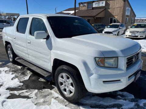 2006 Honda Ridgeline for sale at BERKENKOTTER MOTORS in Brighton CO