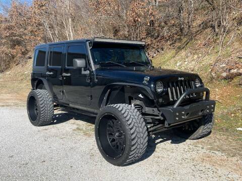 2011 Jeep Wrangler Unlimited for sale at B&B AUTOMOTIVE LLC in Harrison AR