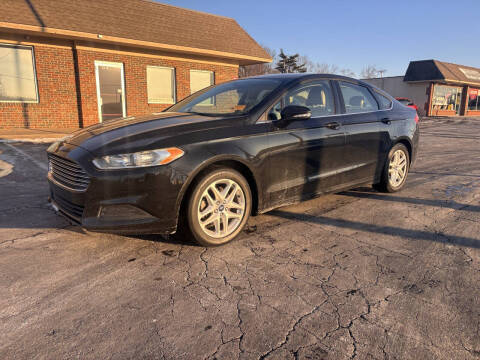 2013 Ford Fusion for sale at Xtreme Auto Mart LLC in Kansas City MO