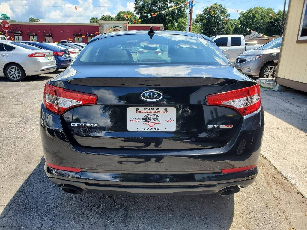 2012 Kia Optima for sale at DAGO'S AUTO SALES LLC in Dalton, GA